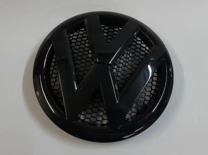 Original VW Transporter T5 7H Emblem vorn für Kühlergrill schwarz 7E0853601D 041 - Bild 1 von 1