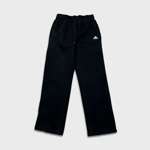 Pantalones deportivos Adidas para hombre medianos negros deletreados pierna ancha polar cómodo jogger - Imagen 1 de 8