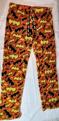 sleepwear  Batman-themed, featuring orange, yellow, and black colors, and is... - Image 1 of 4