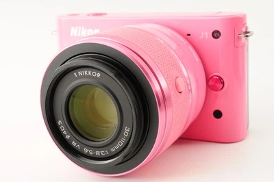 [COMO NUEVA] Cámara digital sin espejo Nikon 1 J1 rosa + lente VR de 30-110 mm DE JAPÓN Foto 1 de 4