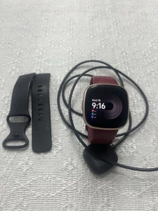 Fitbit Versa 4 With Wine Red Band,USB Charger & Additional Black Band - Picture 1 of 6