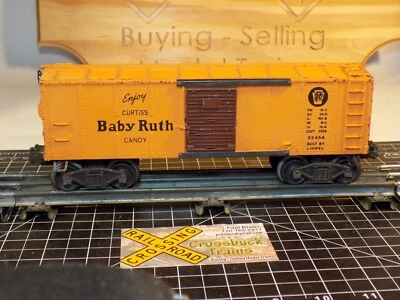 O-scale postwar Lionel Boxcar Baby Ruth X2454 PRR metal trucks (S052813) - Image 1 of 4
