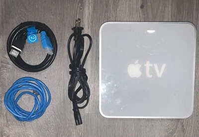 Transmisor multimedia Apple TV 1ª generación 40 GB A1218 blanco con cables de alimentación y HDMI Foto 1 de 4