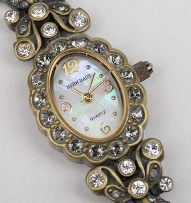 Reloj pulsera vintage de cuarzo Heidi Daus con diamantes de imitación y cristal azul Foto 1 de 4