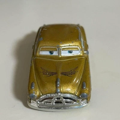Tomica Cars Doc Hudson 金色 #PG1JB2 — 第 1/4 张图片