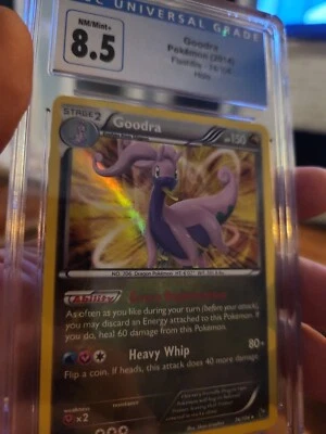 Pokemon Goodra Flashfire 74/106 Holo CGC 8.5 NM/MINT PSA - Image 1 of 3