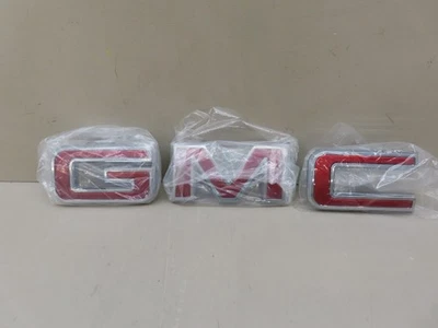 2019-2025 GMC SIERRA 1500 2500/3500HD/YUKON FRONT GRILLE EMBLEM RED OEM 87815663 - Image 1 of 4