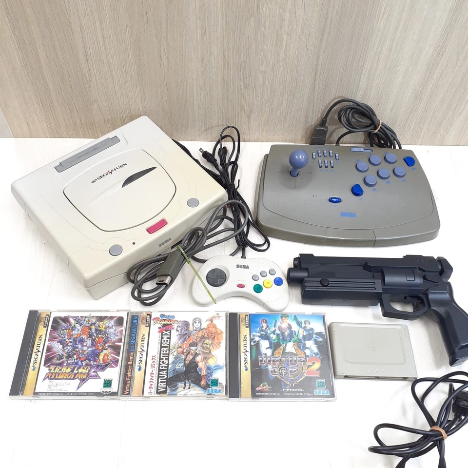 Sega Saturn Console with Virtua Gun, Virtus Stick, 3 games & memory Japan white - Image 1 of 4