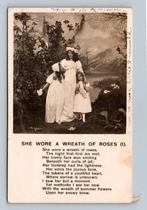 She Wore A Wreath Of Roses Poem Dress Vintage Divided Back Postcard RPPC - Picture 1 of 2