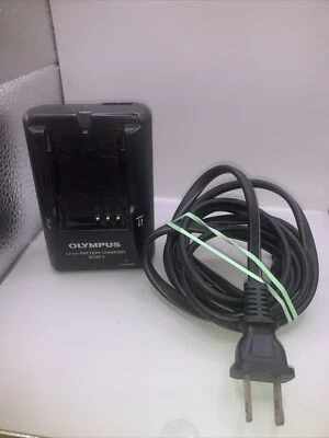 Cargador de batería de iones de litio original Olympus BCM-1 Foto 1 de 3