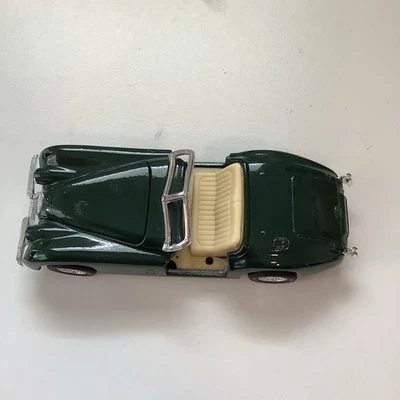 Jaguar XK120 1951 Green Roadster diecast modelo a escala 1:24 - Bburago 22018GRN Foto 1 de 4