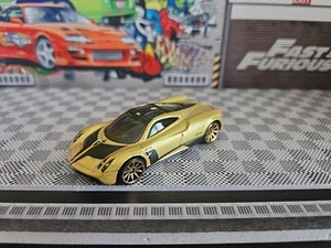 HOT WHEELS 2021 PAGANI HUAYRA gold 1/64 Combine postage VGC - Picture 1 of 16
