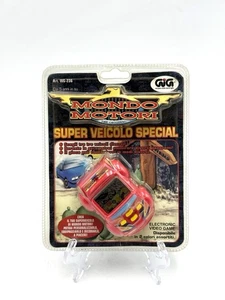 MONDO MOTORS SUPER VEHICLE SPECIAL GIG NO TAMAGOTCHI ELECTRONIC Lcd Game # GQ - Bild 1 von 2