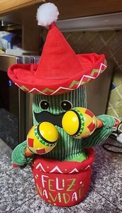 Merry Bright Cactus Musicale Giocattolo Animato Canta Feliz Navidad & Dances!  - Foto 1 di 7