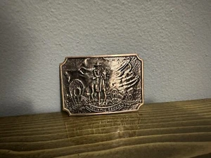 Vintage TALL IN THE SADDLE belt buckle - cowboy on horse with covered wagons - Picture 1 of 2