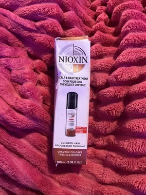 nioxin 4 scalp & hair treatment colored hair progressed thinning Foto 1 de 4