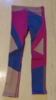Spodnie sportowe Nike damskie rozmiar M różowe niebieskie wzór rajstopy