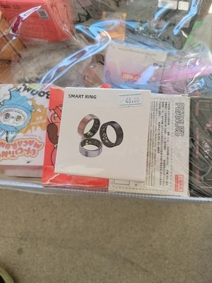 Anillo inteligente, tamaño 8 negro, cable de carga, estuche y guía del usuario incluidos Foto 1 de 4