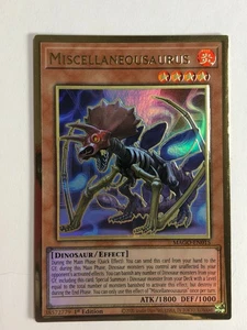 Yugioh! TCG Premium Gold Rare 1st Edition Miscellaneousaurus MAGO-EN015 NM - Picture 1 of 3