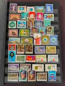 COLLECTION OF UNITED NATIONS GENEVA OFFICE STAMPS IN STOCK BOOK PAGES - Picture 1 of 13