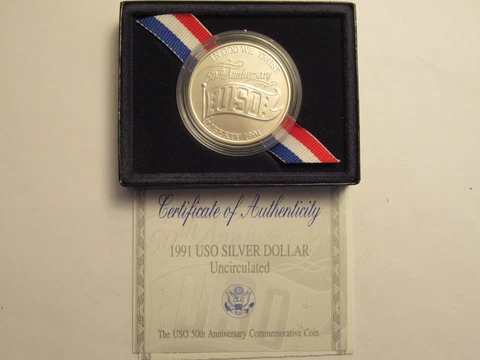 1991 USO Uncirculated Silver Dollar, mint pkg/ COA Cover