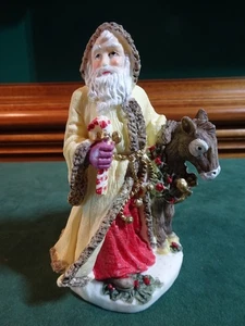 FIGURA DE SANTA CLAUS COLECCIÓN INTERNACIONAL SUIZA, 4,5" T, BURRO - Imagen 1 de 11