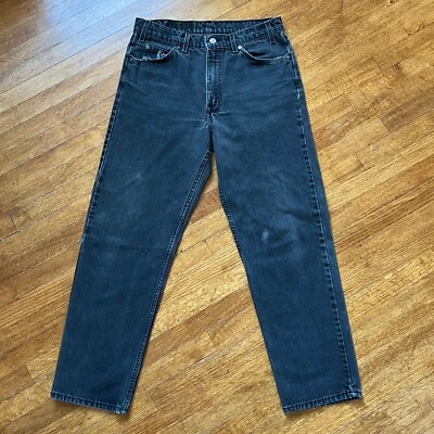 Pantalones de mezclilla Levis Jeans de colección para hombre 30x30 negros desteñidos 550 relax naranja lengüeta EE. UU. 90s Foto 1 de 4