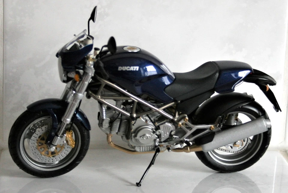 MINICHAMPS 122120104 DUCATI MONSTER 1:12 mit OVP - Bild 1 von 1