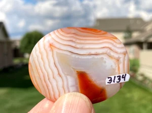 RED AGATE QUARTZ OVAL - about 2  inches long - With STAND - Picture 1 of 7