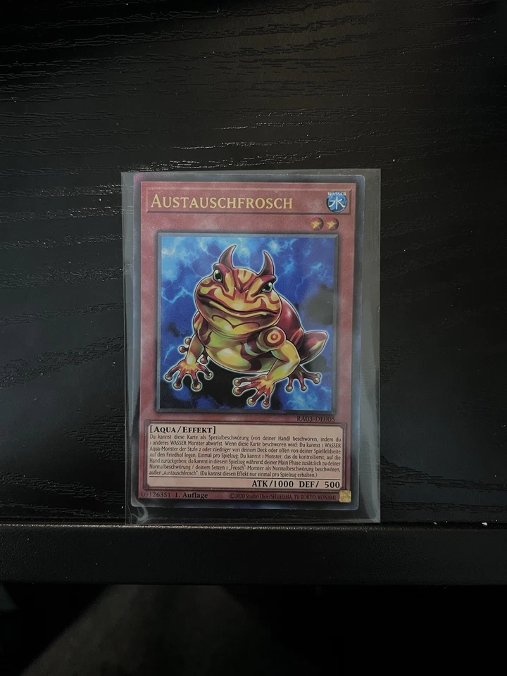 Yu-Gi-Oh! Austauschfrosch - RA03-DE005 - Ultimate Rare 1. Auflage DE NM - Bild 1 von 1