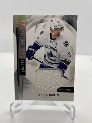 2015-16 Upper Deck Premier Materials Jersey Henrik Sedin #28  27/199 - Image 1 of 2