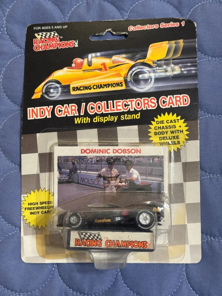 CAMPEONES DE CARRERAS DOMINIC DOBSON RÉPLICA COCHE DE CARRERAS FUNDIDO A PRESIÓN - FONDO PLANO Foto 1 de 1