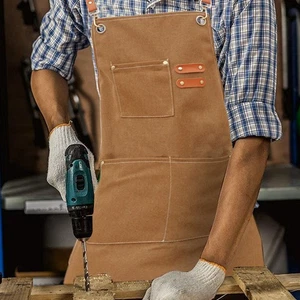 Delantal de lona impermeable de algodón con bolsillos - Delantal de trabajo ajustable y duradero - Imagen 1 de 10