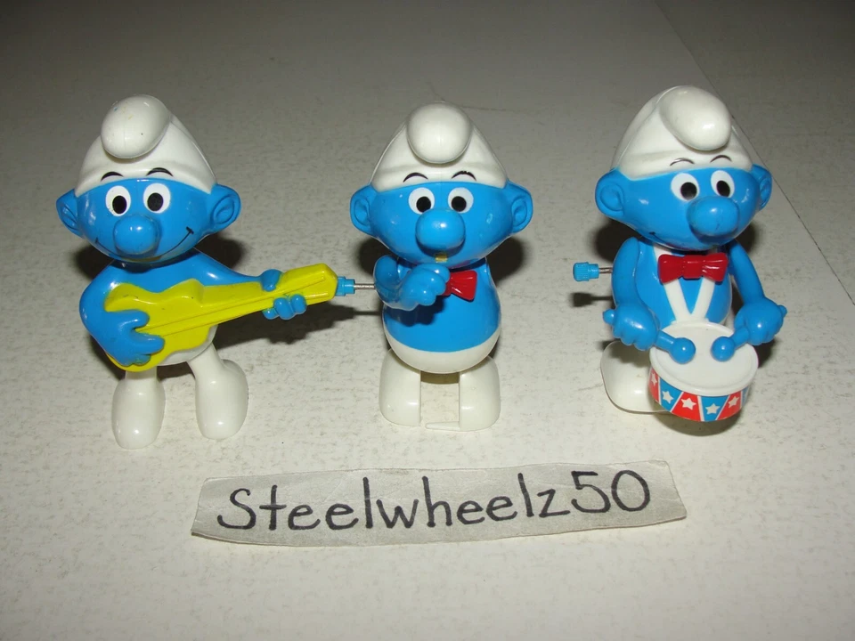 Vintage Wind Up Smurfs Musicians 3 Figure Lot 1982 Galoob Drummer Guitar Horn - Image 1 of 4