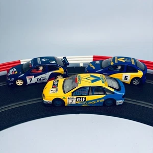 SCALEXTRIC RENAULT MEGAN C2007 C2477 & LAGUNA C136 SLOT CAR X3 HORNBY RACING - Picture 1 of 16