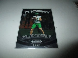 Bo Nix 2024 Panini Prizm Draft Picks Trophy Hunting RC #TH-BNX - Picture 1 of 1