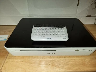 Reproductor de discos Blu-ray Sony 1080p NSZ-GT1 Internet y NSG-MR1 control remoto solo piezas  Foto 1 de 4