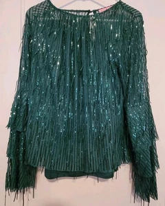 Top con flecos Eva Franco lentejuelas acadia brillo pino campana manga pequeña forrada verde  - Imagen 1 de 12