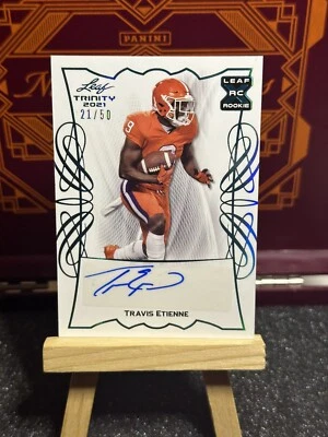 TRAVIS ETIENNE 2021 Leaf Trinity XRC Rookie AUTOGRAPH SP # 21/50 AUTO JAGUARS RC - Image 1 of 2