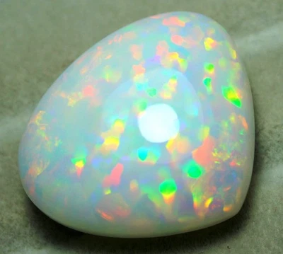 Piedra preciosa suelta natural certificada IGI ópalo etíope blanco multi fuego 31,60 quilates Foto 1 de 4