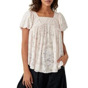 Top babydoll Free People Sweet Escape pizzo trasparente rosa avorio taglia large - Foto 1 di 8