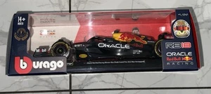 Burago 1/24 F1 Red Bull Racing Max Verstappen 2022 Abu Dhabi Grand Prix Winner - Picture 1 of 3