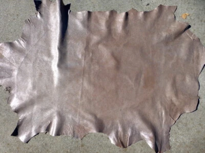 calfskin leather hide Large Distressed Metallic Wash on Brown Grainy Texture - Image 1 of 4