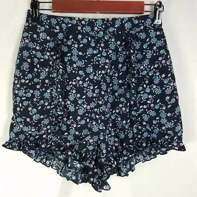 Pantalones Cortos Xhilaration Para Mujer Pequeños Negros Tiro Alto Floral Volantes Culotte Foto 1 de 4