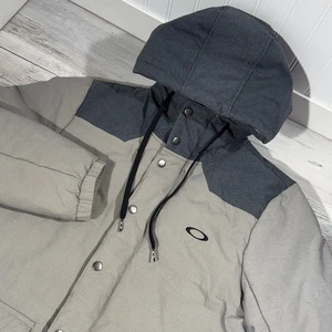 Oakley Parka Jacke beige isoliert Kapuze Kordelzug Druckknöpfe Skifahren Herren S - Bild 1 von 12