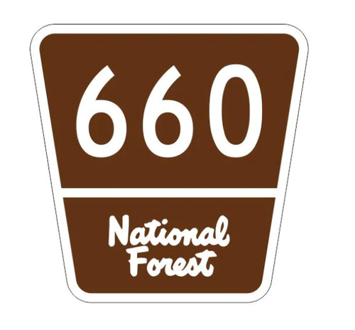 Brown 5-inch bumper sticker with white text “660 National Forest” and white chevron-shaped road sign.