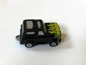 Micro Machines (1988) '57 Chevy Blazer SUV, Black w/ Yellow Flames - Picture 1 of 2