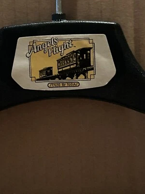 Colgador de ropa vintage "Angels Flight" discoteca publicidad estilo Tobias Foto 1 de 3