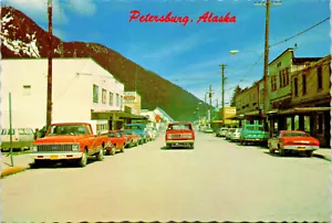 Cartolina d'epoca AK ALASKA Street View Business Rexall droga insegna e auto - Foto 1 di 4