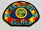 Key West Police Department Autism awareness patch. KWPD & ASK
